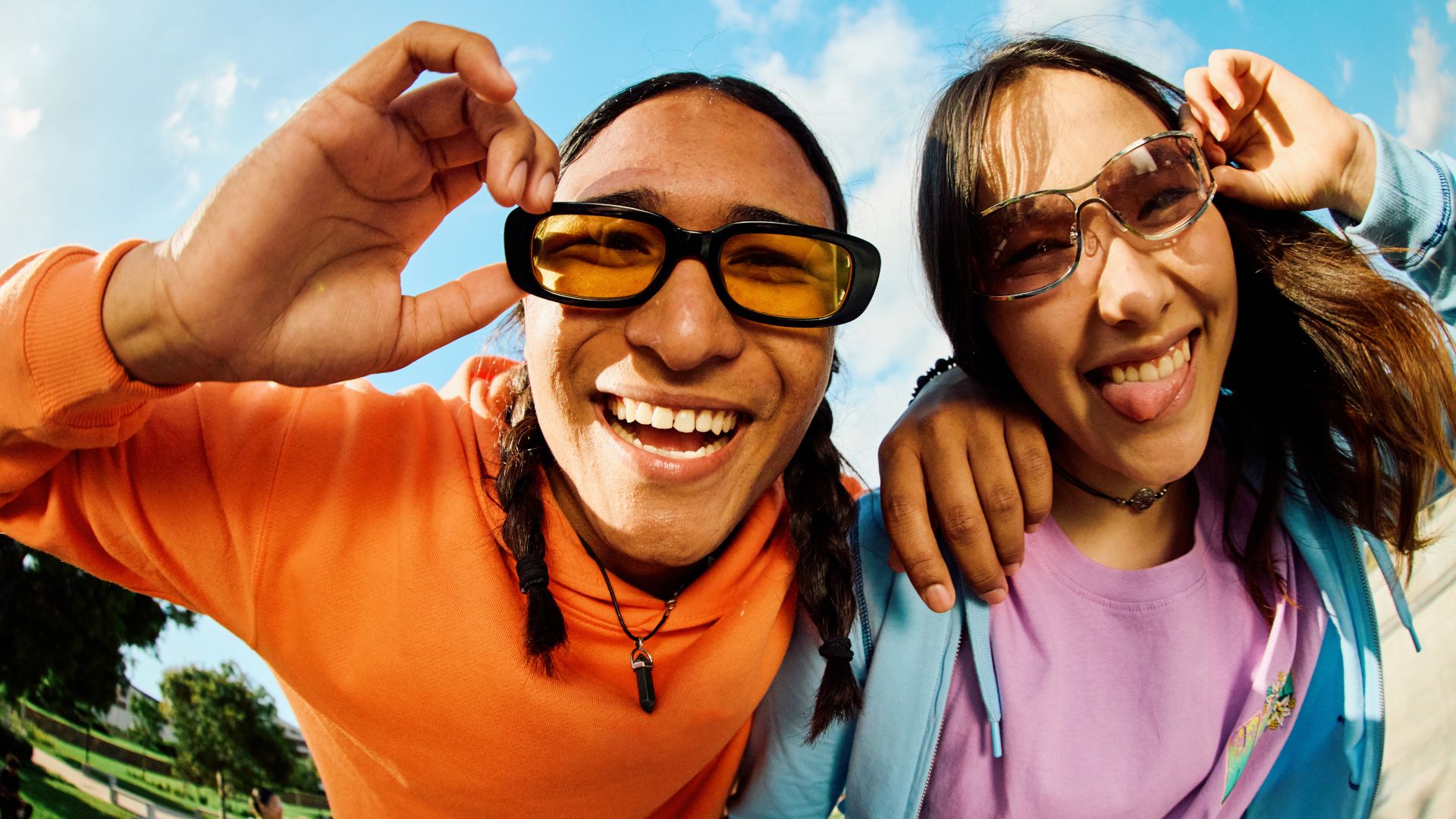 A couple sport their sunglasses and prescription lenses.