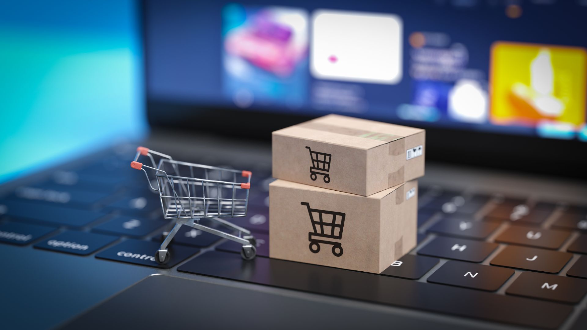 A laptop with digital 3d shopping cart and packages represent how Selling Cosmetics Online in Canada are increasingly regulated.