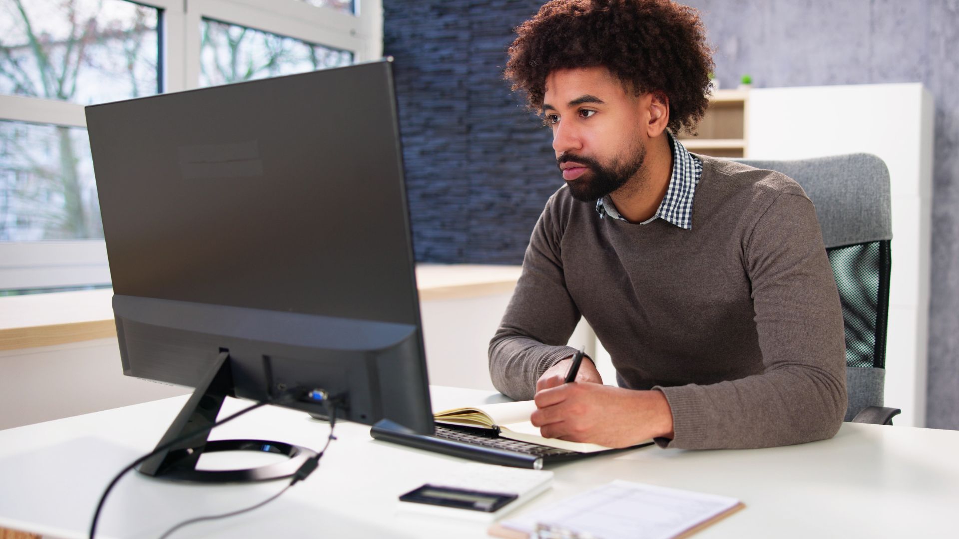 A man researches the differences and advantages of HACCP vs. SQF.