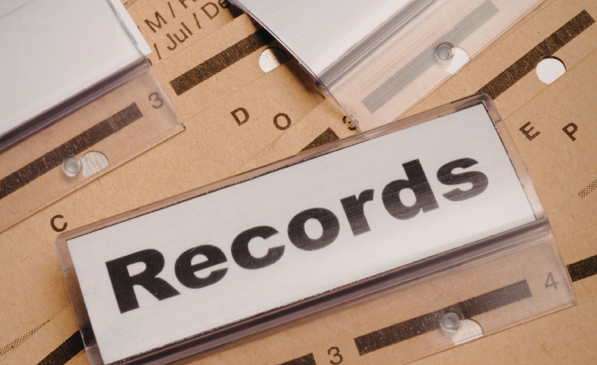 FSVP Records are scattered on a table.