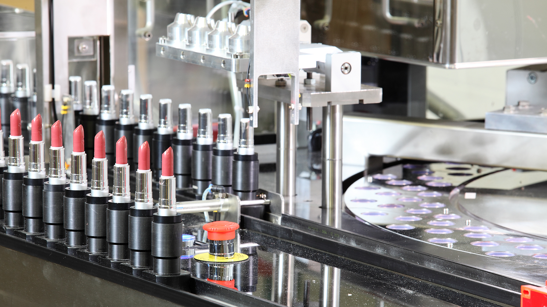 lipstick being manufactured on production line